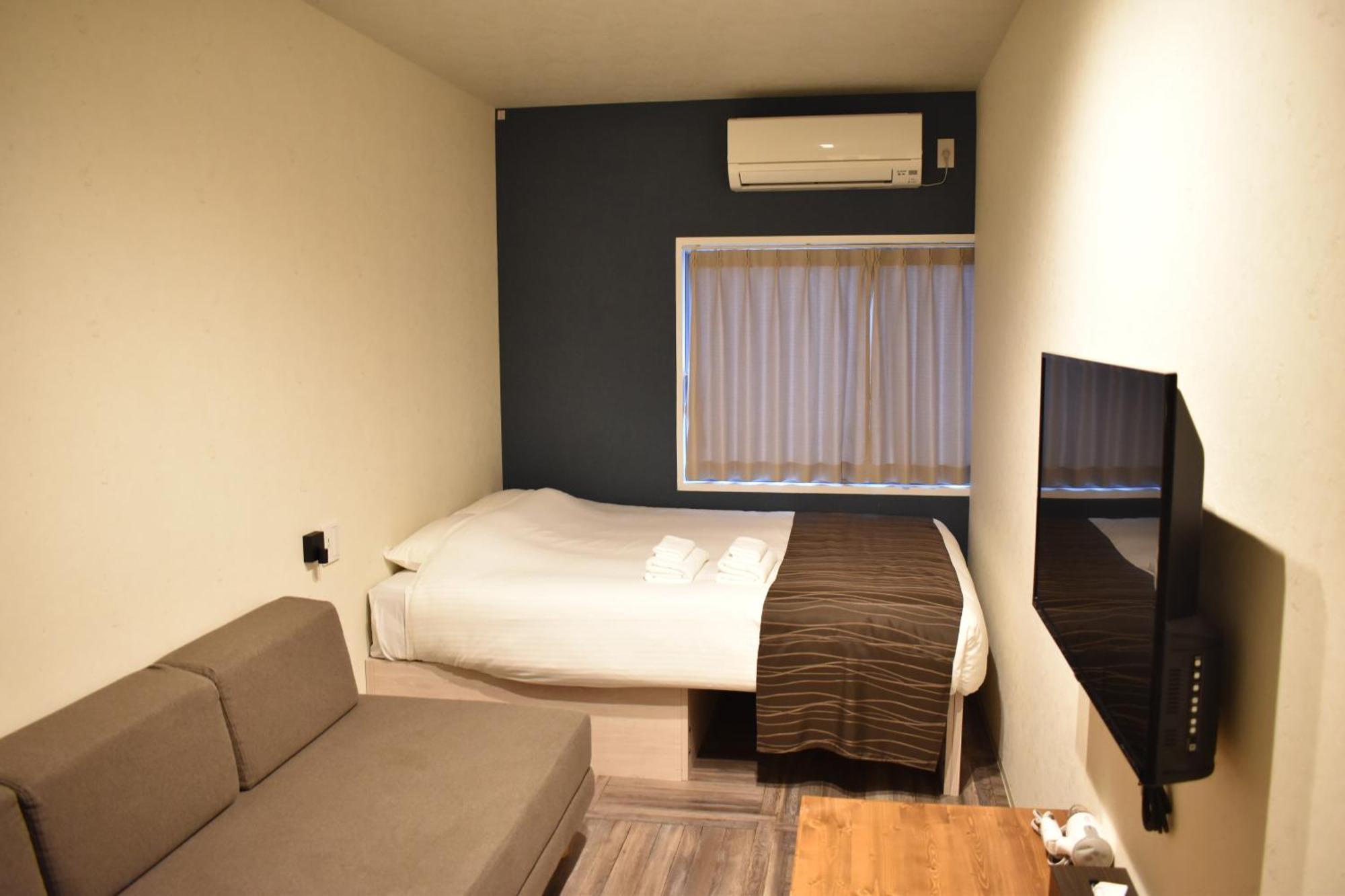 Hotel Shinsaibashi House Ōsaka Zimmer foto